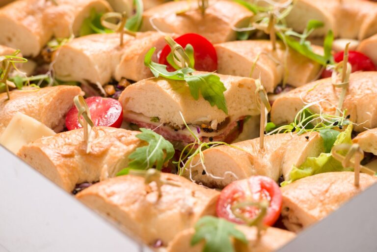 Assorted sandwiches arranged on a platter; illustrative photograph